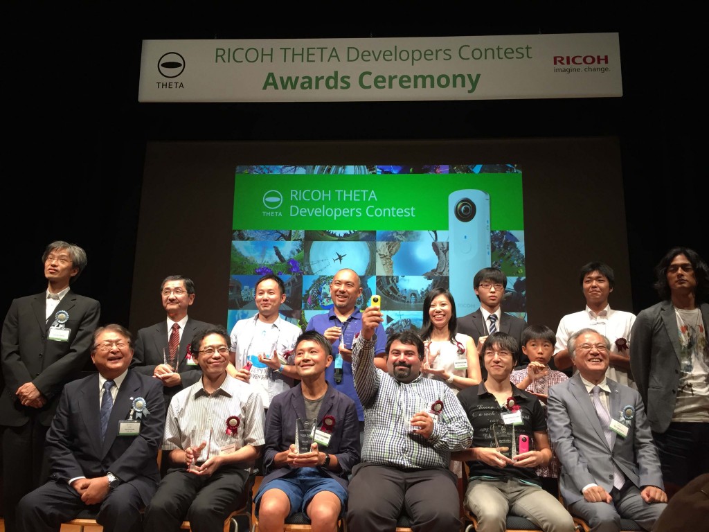 Back row, second from left: Makoto Igarashi, president of MTI