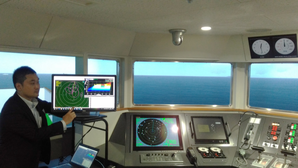 A demonstration of the Automatic collision avoidance system (b) using JMS's vessel handling simulator